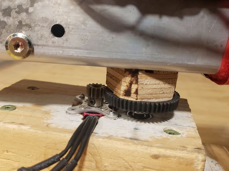 motor mounted below the crown and pinion